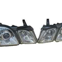 Lexus LX470 Headlights Driver & Passenger Side Pair Genuine