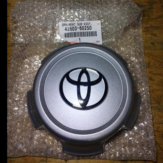 GENUINE TOYOTA ORNAMENT SUB-ASSY, WHEEL HUB (FOR FRONT) 42603-60250